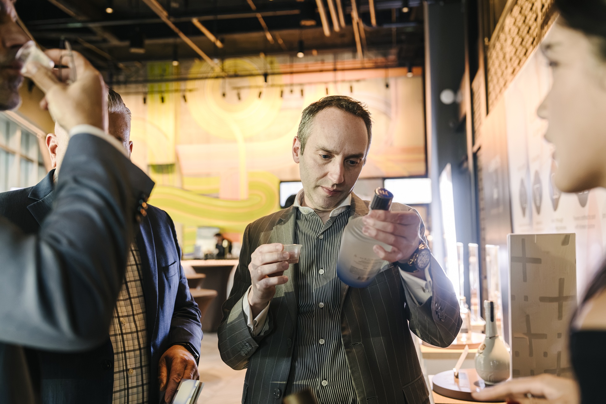 An attendee is tasting jari product at the brand's Los Angeles launch event